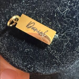 “Daniel” bar charm